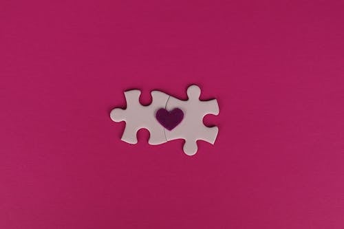 Puzzle Pieces with a Formed Heart in the Middle