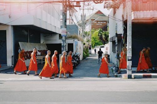 Side View of Monks Walking in the Street