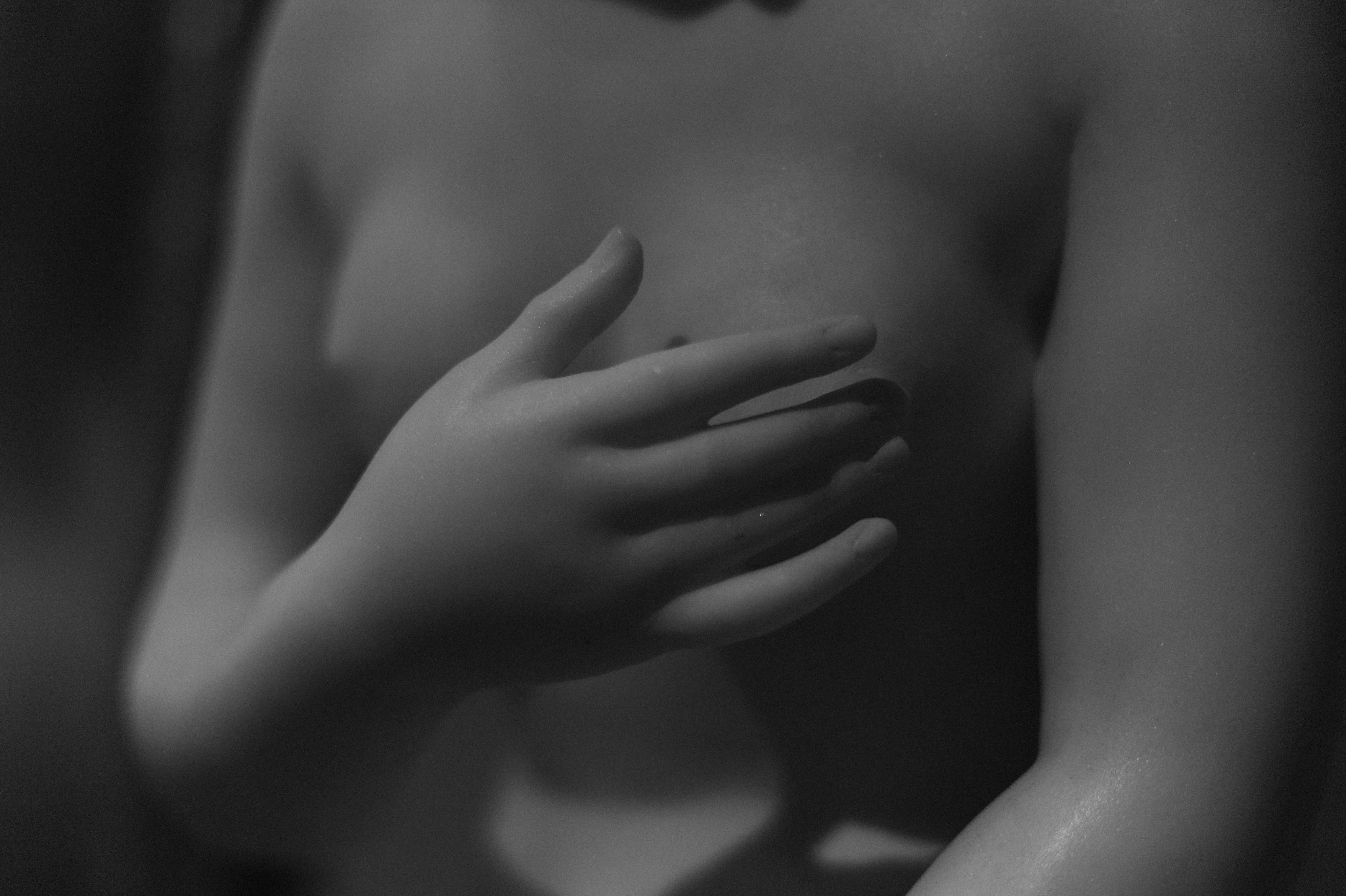 Woman Hand Covering Breasts · Free Stock Photo