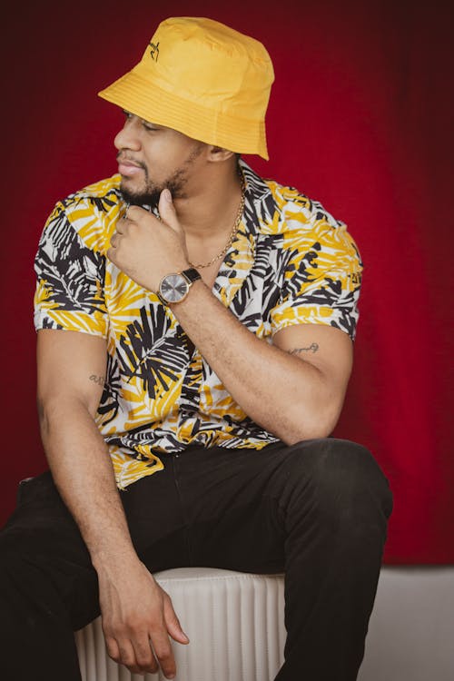 Man in Printed Shirt Posing with hand on Chin