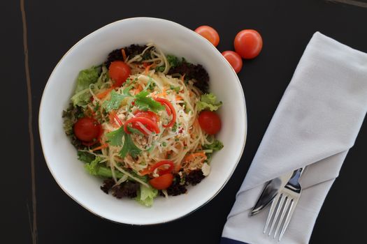 A vibrant salad made with fresh vegetables and cherry tomatoes, perfect for a healthy meal.
