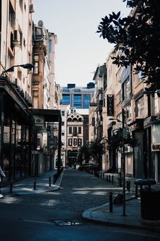 Explore the vibrant architecture of a lively street in Istanbul, capturing the essence of urban life.