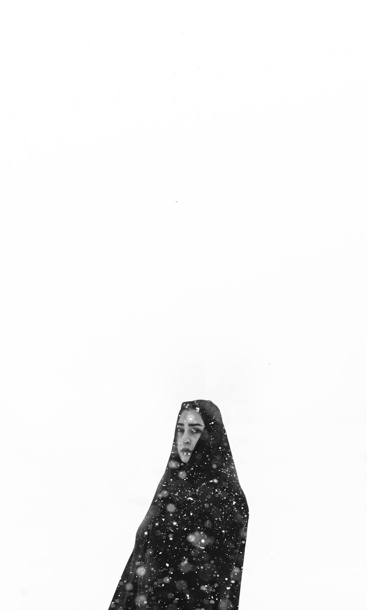 Woman In Snow On White Background