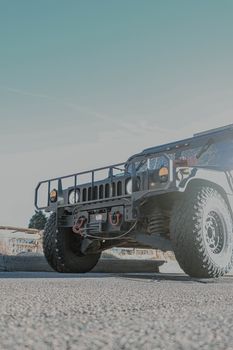 A side-by-side compact SUV comparison showing the Thar 3-door and a standard crossover parked on a city street.