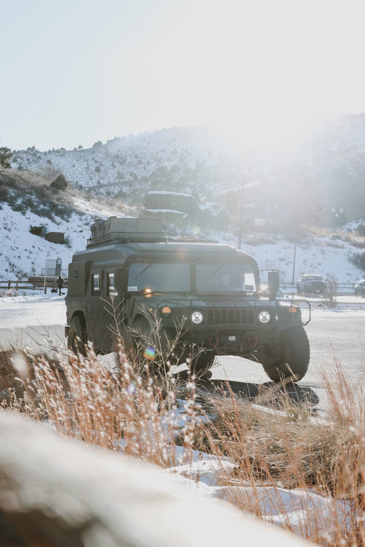 Military Vehicle Parked On Roadside