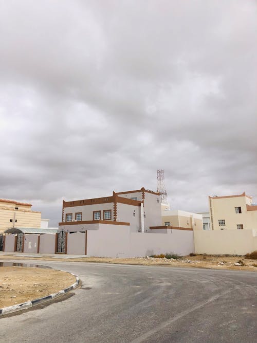 Buildings against a Cloudy Sky 