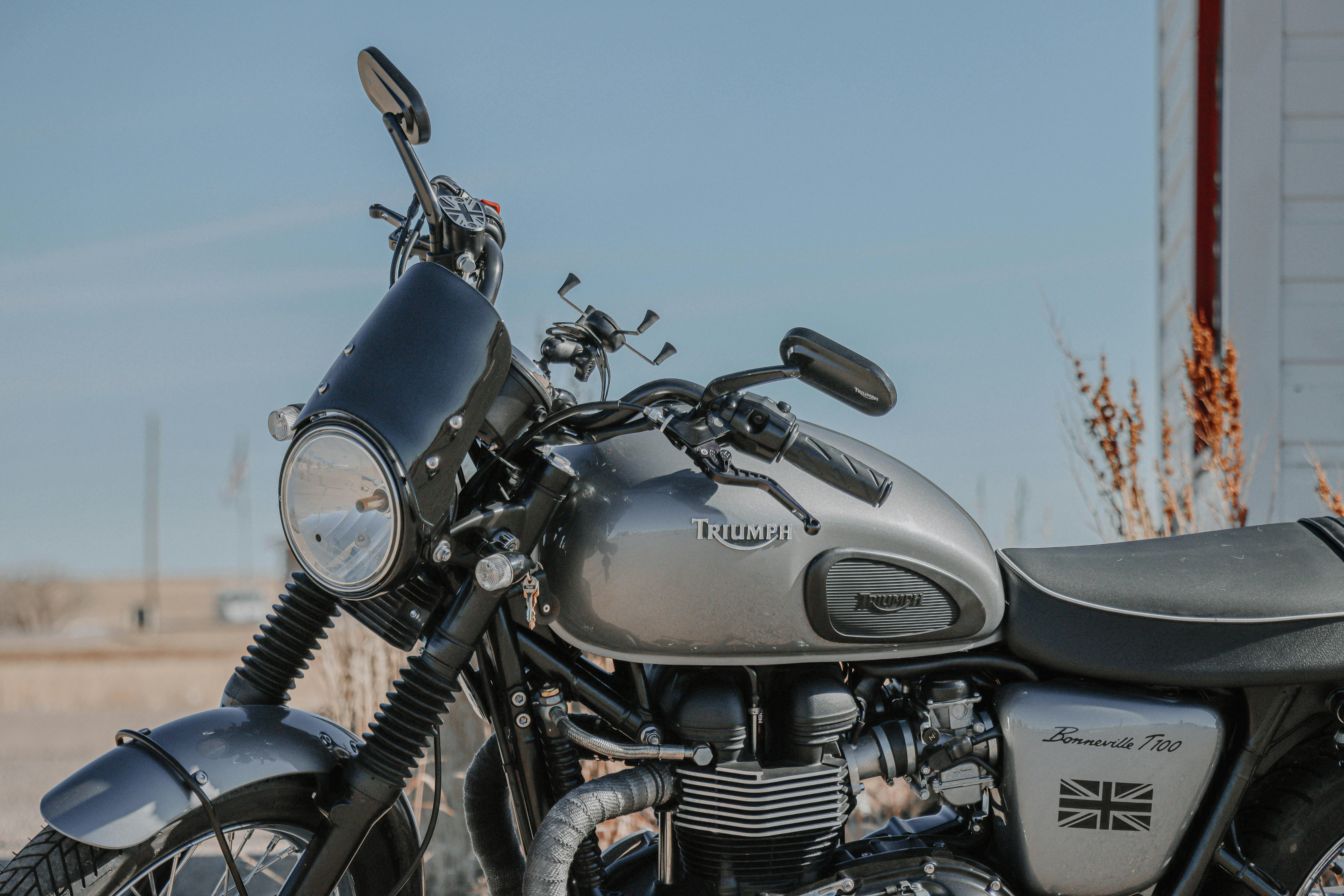 Stunning close-up of a Triumph Bonneville T100 motorcycle captured outdoors.