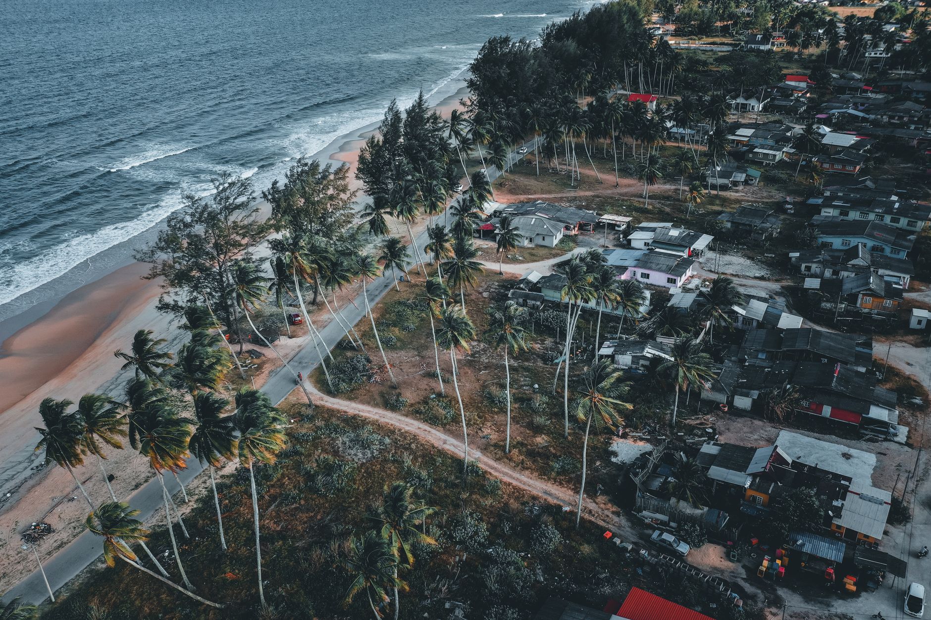 Slave-trade era buildings in Badagry with palm trees