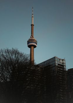 Stunning view of the CN Tower silhouetted against a dusk sky in Toronto, Canada.
