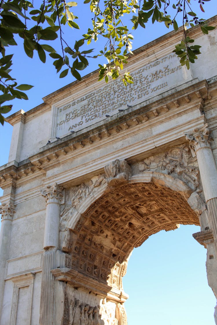 Ancient Arch On Blue Sky Background