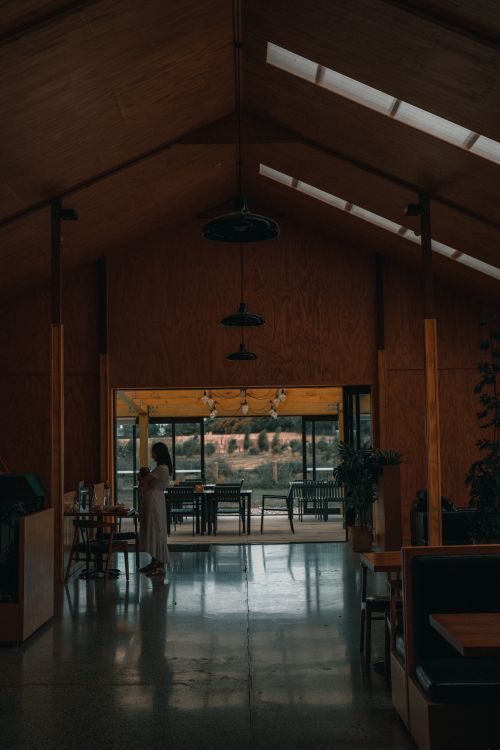 Free A tranquil interior space featuring large windows and a scenic view, perfect for relaxation. Stock Photo