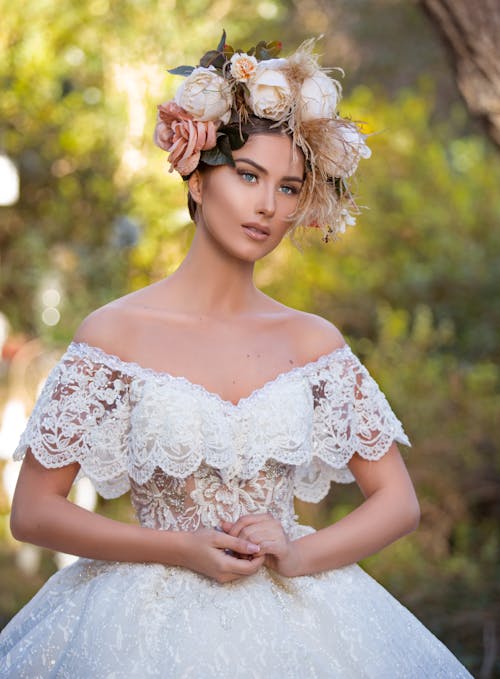 Woman in White Lace Wedding Dress and Flower Crown