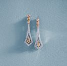 Earrings with Diamonds on Blue Surface