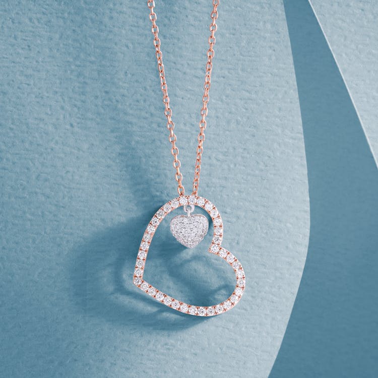 Close-Up Shot Of A Diamond Heart Necklace