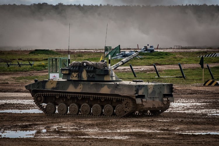 Military Tank In Mud