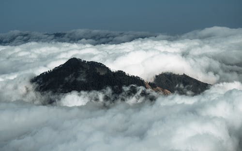 Green Mountain Over White Clouds