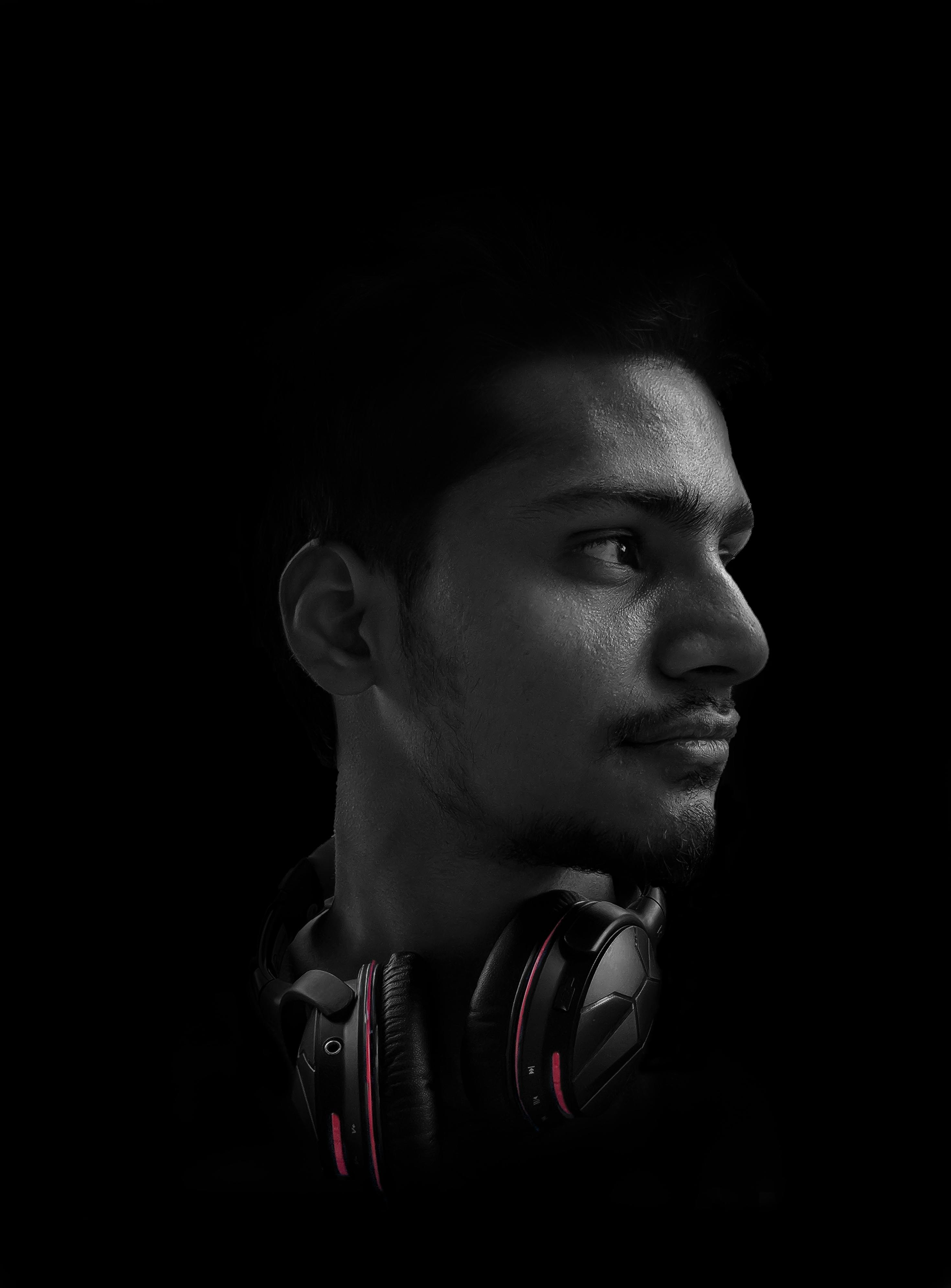 Photo of Man Wearing Black and Red Headphones · Free Stock Photo