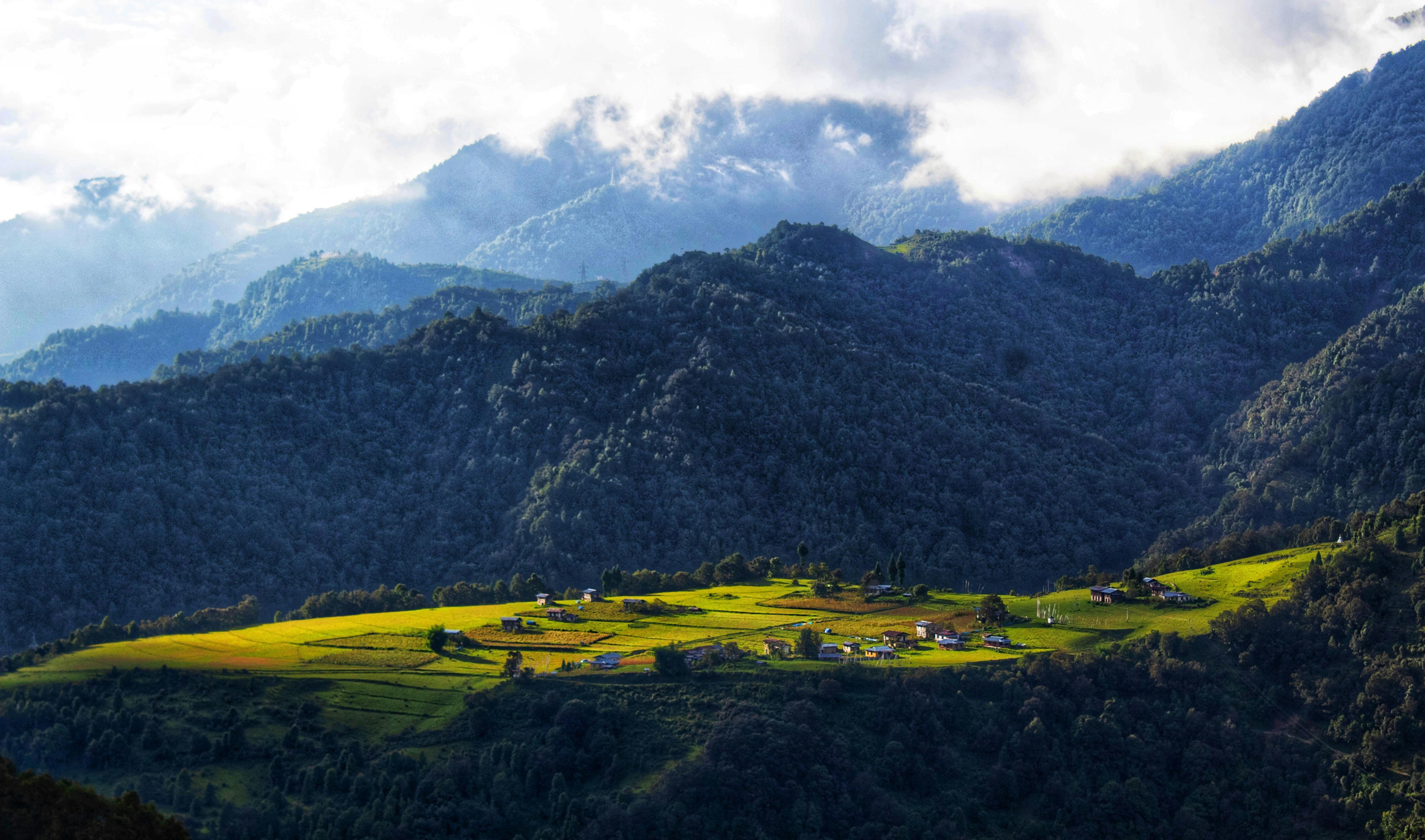 Breathtaking view of Khaling village nestled in Bhutan's lush mountains and valleys.
