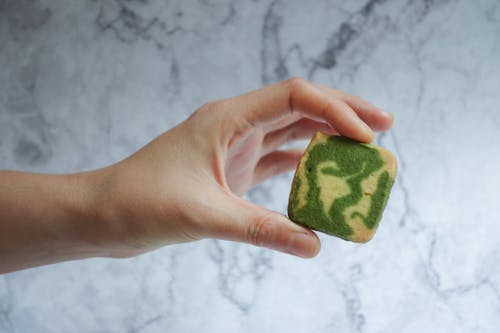 Person Holding Baked Food