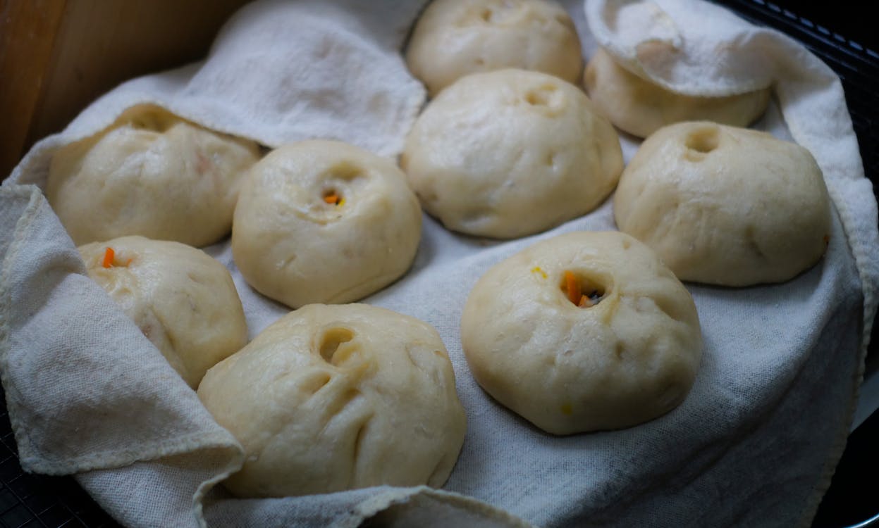 Dumplings on White Textile