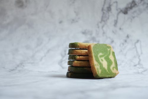 Close-Up Photo of Matcha Cookies on Marble Background