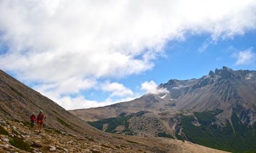 Landscape Photography of Mountain Under Cloudy Sky