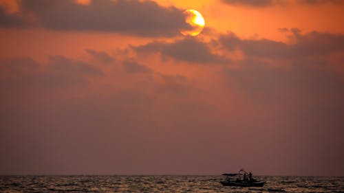 Kostnadsfri bild av båt, goa, gyllene solnedgång