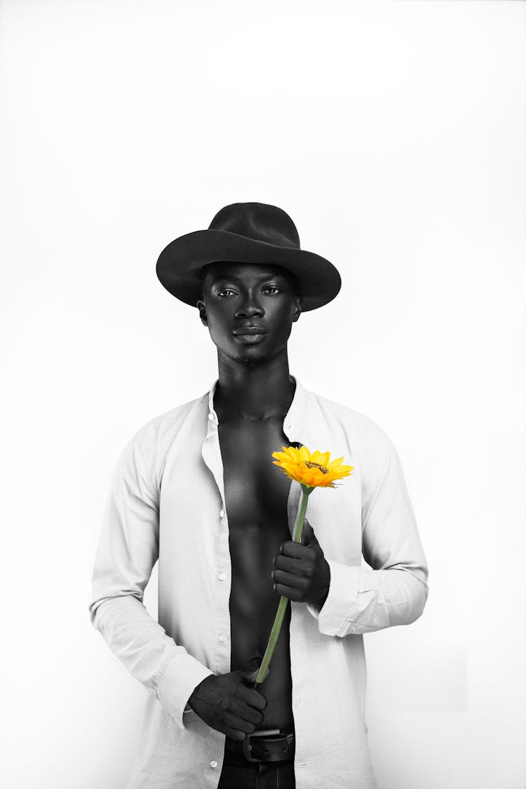 Man In Hat With Sunflower