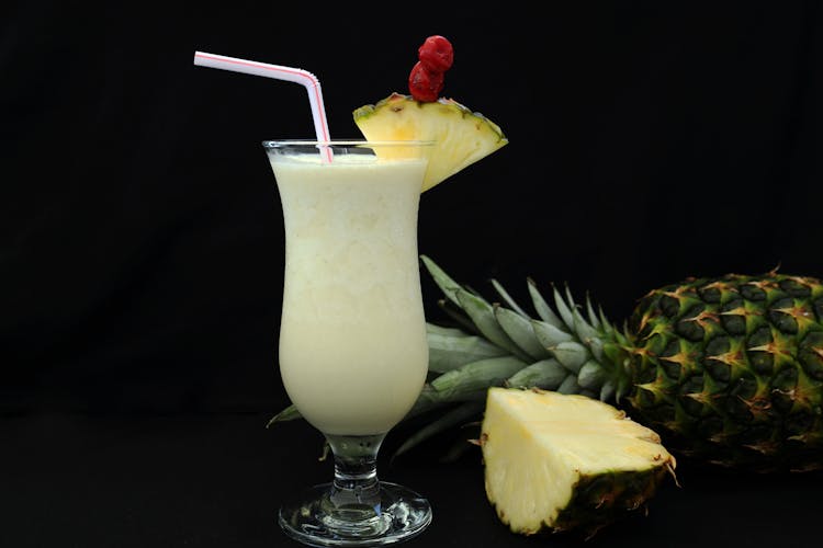 Close-Up Shot Of A Glass Of Pina Colada 