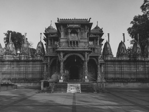 Free Black-and-white photo of the historic Hutheesing Jain Temple in Ahmedabad, India, showcasing intricate architectural design. Stock Photo