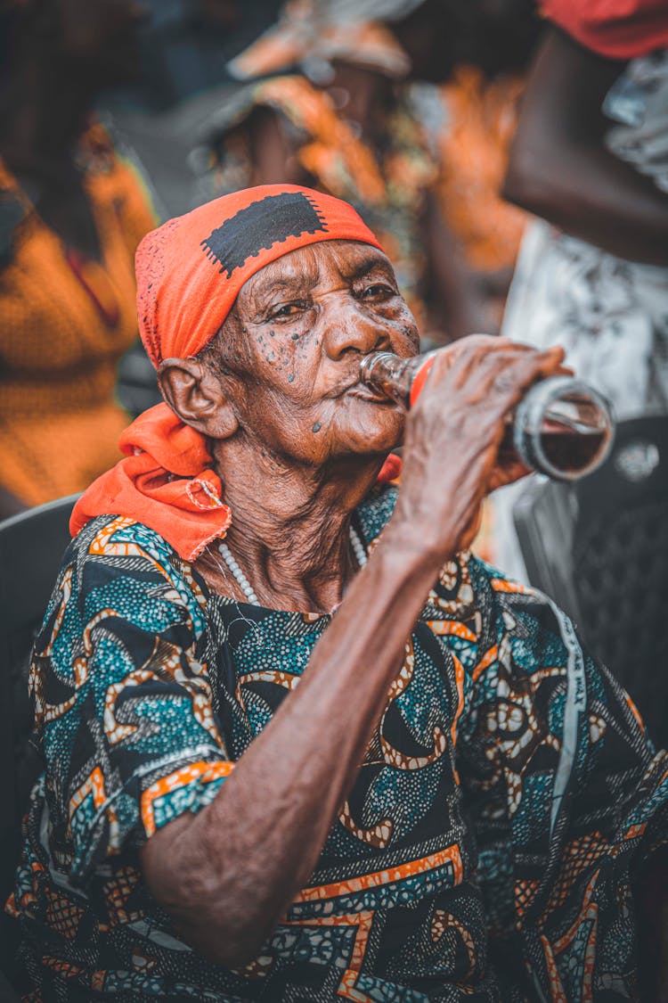 Woman Drinking From Bottle