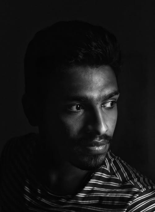 Grayscale Photo of a Man
