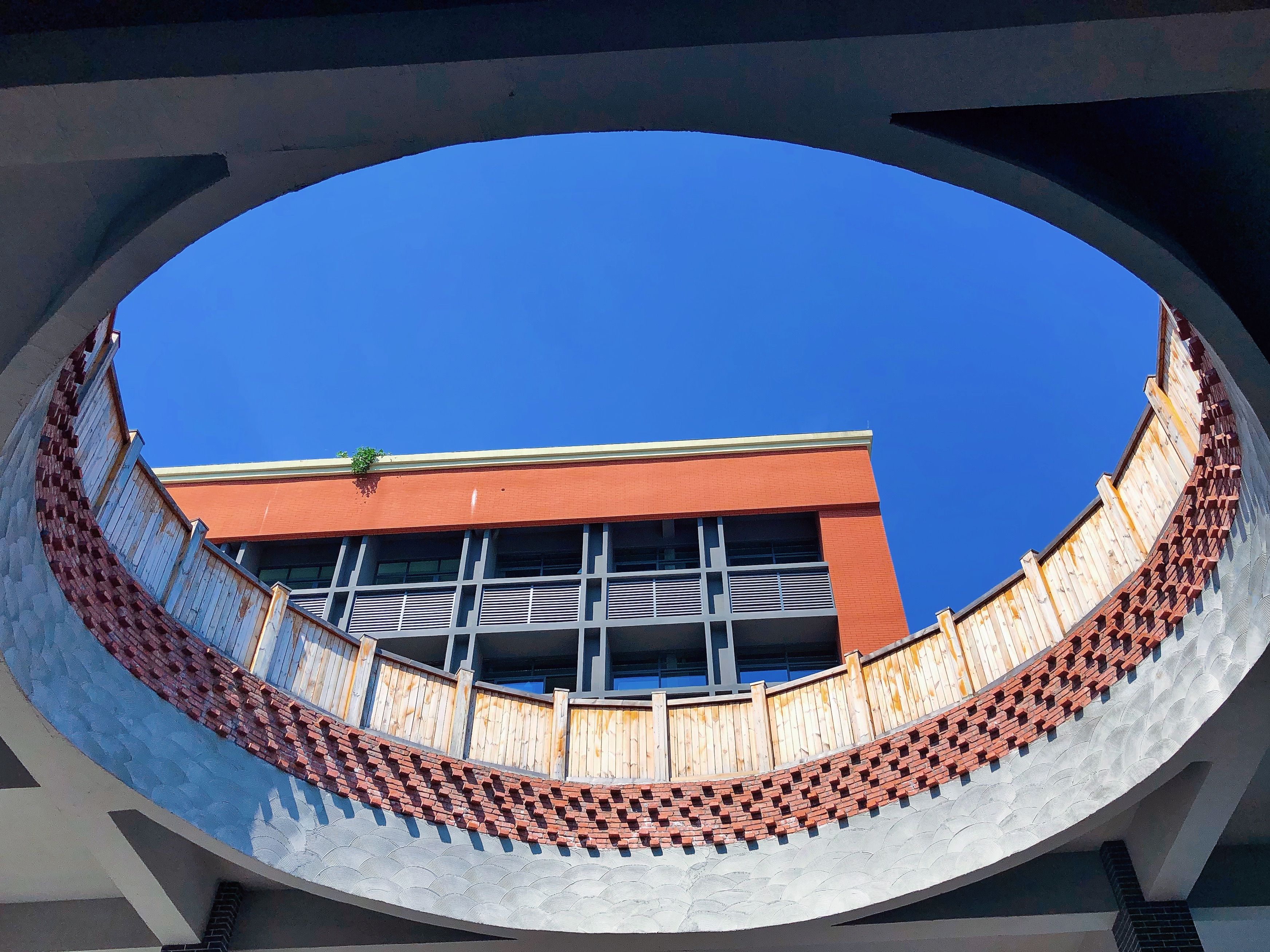Low Angle Shot of Building with an Open Ceiling · Free Stock Photo