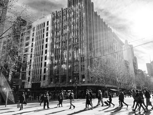 People Crossing Street in City