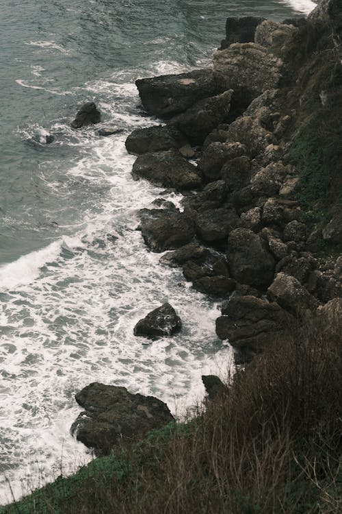 Free Waves Crashing on Rocks  Stock Photo