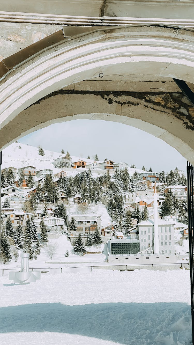 Mountain Village In Snow 