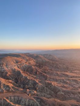 Stunning aerial view of a Turkish canyon landscape bathed in the warm light of sunrise.