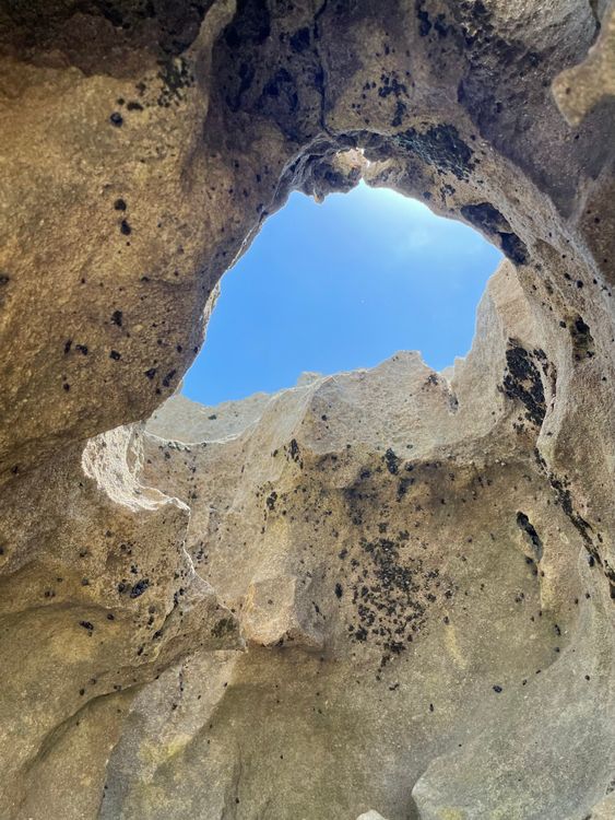 Sky Behind Rocks Clear Sky behind Hole in Rocks · Free Stock Photo