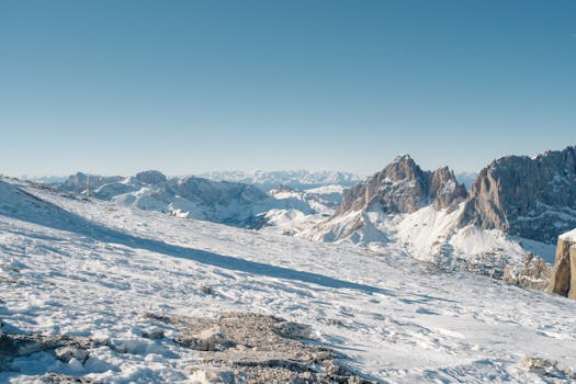 Breathtaking view of winter landscapes in the Dolomites with clear skies.