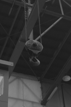 Black and white photo of a hook in a factory setting in Amsterdam.