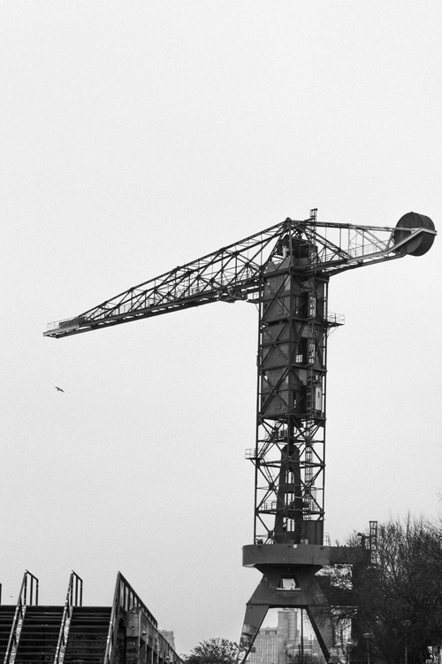Black and White Photo of Cranes in a Dock · Free Stock Photo