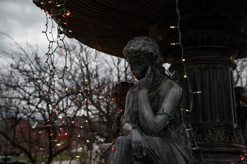 Outdoor Statue with Hanging String Lights