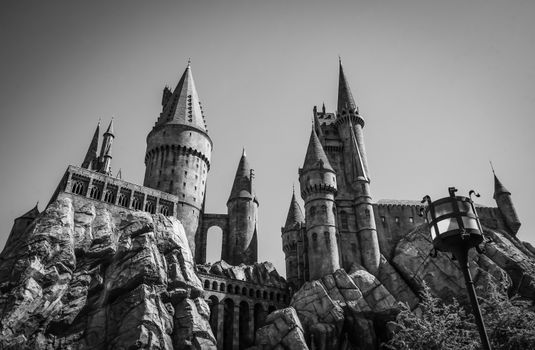 Stunning black and white image of the iconic Hogwarts Castle at Universal Studios Hollywood., free online jigsaw puzzle on JigsawPuzzlesFreeOnline.org