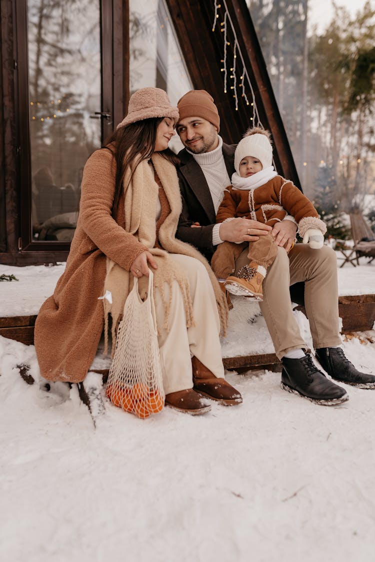 A Family In Winter Clothes