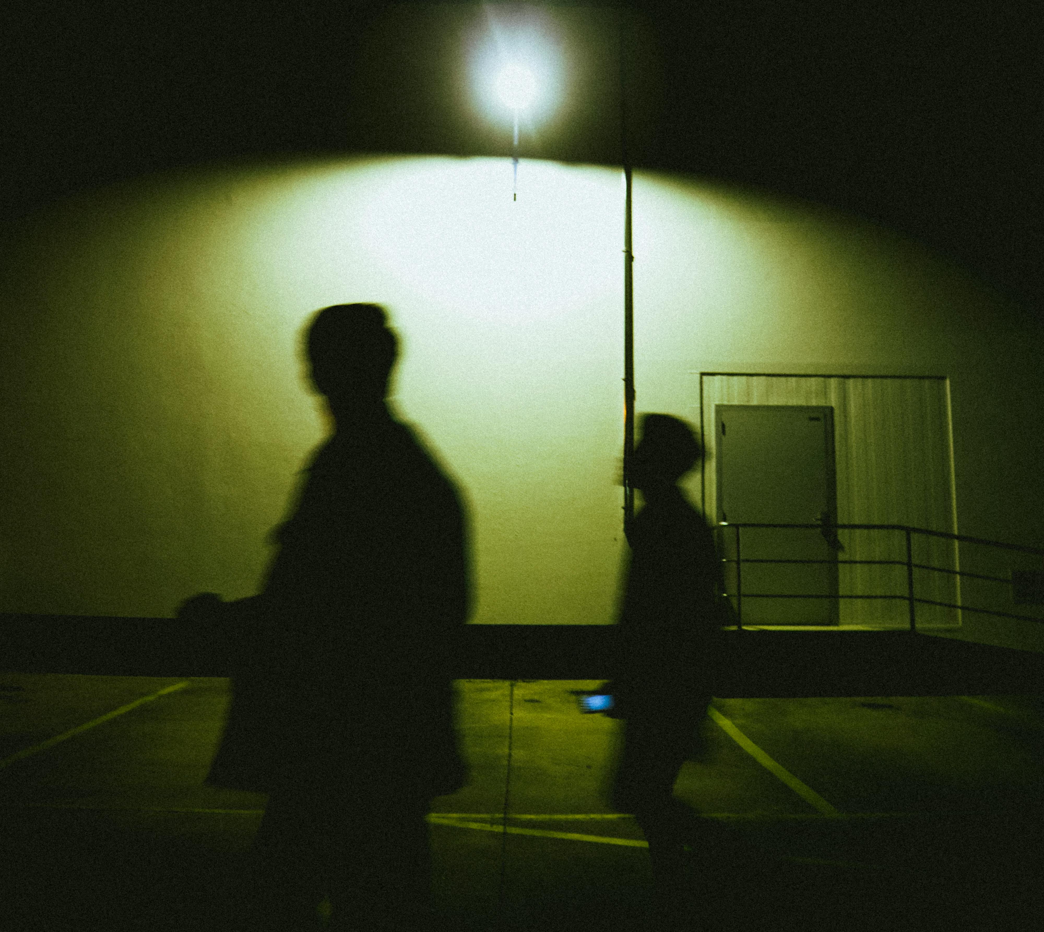 Silhouette Of People Near Fountain · Free Stock Photo