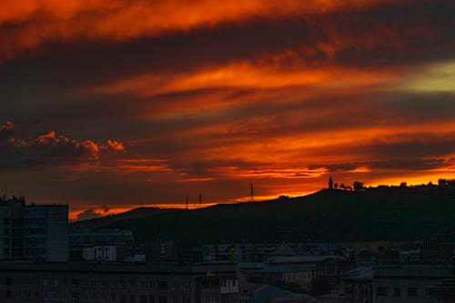 Безкоштовне стокове фото на тему «Аерофотозйомка, будівлі, Захід сонця»