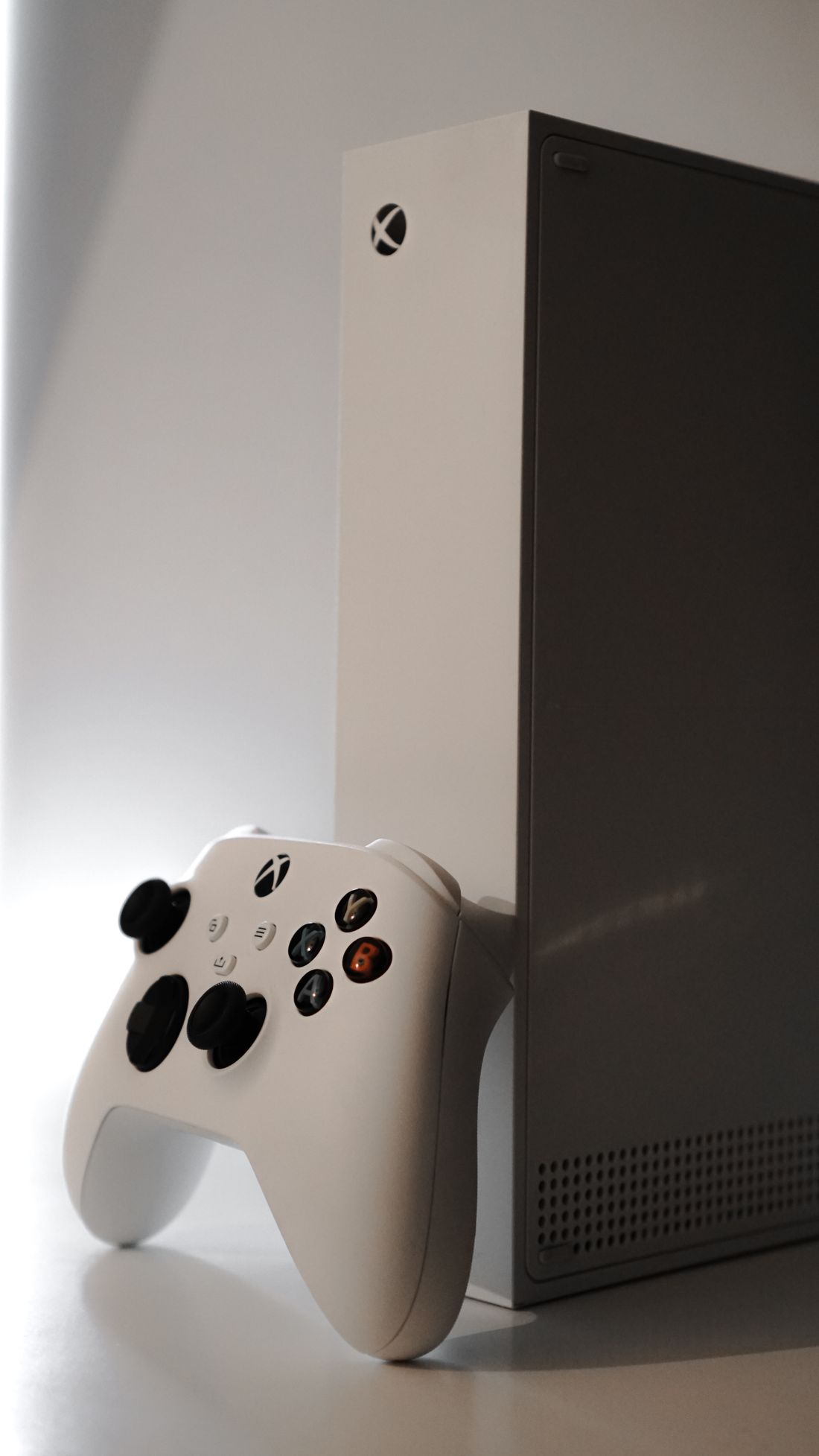 White Xbox console and controller