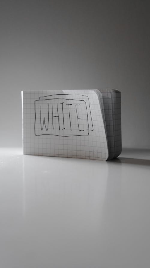 White Text on Paper