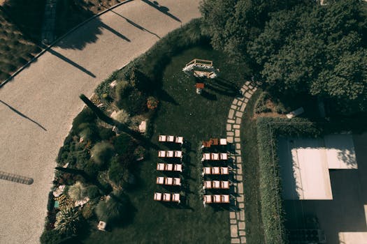 Drone shot capturing a beautifully arranged outdoor wedding ceremony area in Torbalı, İzmir.