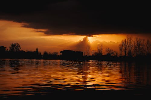 bezplatná Základová fotografie zdarma na téma jezero, mraky, oranžová obloha Základová fotografie